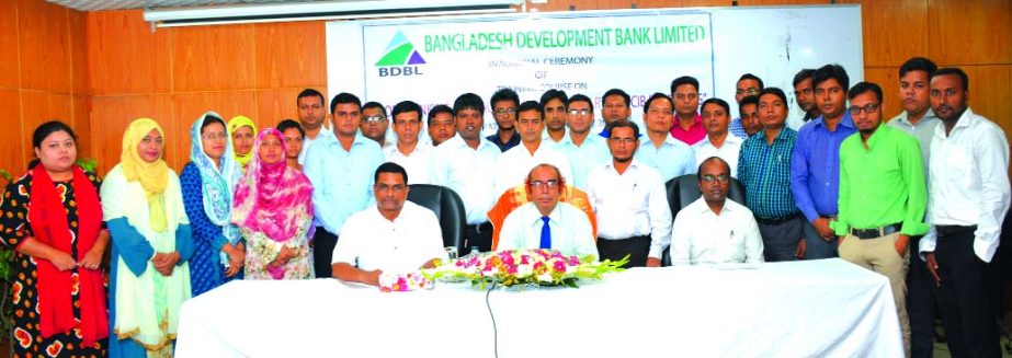 Manjur Ahmed, Managing Director of Bangladesh Development Bank Limited, poses for a photo session with the participants of a 4-day long training course on "Core Banking Solution (CBS), BACH, BEFTN, RTGS and CIB Reporting" at its Training Institute in th