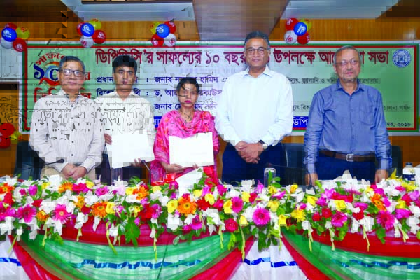 Participants at a ceremony organised on the occasion of the tenth founding anniversary of Dhaka Power Distribution Company Limited at its office in the city on Wednesday.