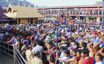 Hindu worshippers stand in long queues outside the Sabarimala temple in the southern Indian state of Kerala. India's Supreme Court on Friday, lifted the temple's ban on women of menstruating age, holding that equality is supreme irrespective of age and