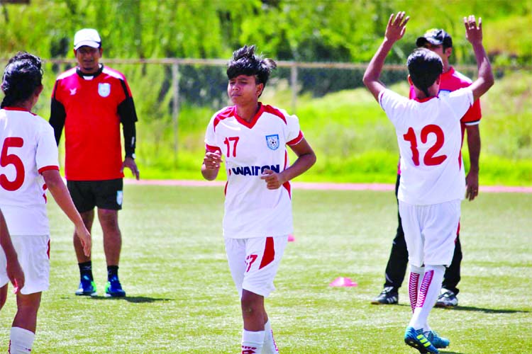 Members of Bangladesh Under-18 National Women's Football team during their practice session in Bhutan on Friday.