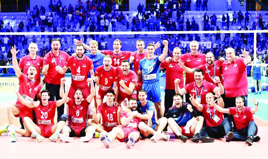 Serbia players celebrate their win after the Men's World Championships volleyball match between Serbia and Italy in Turin, Italy on Wednesday.