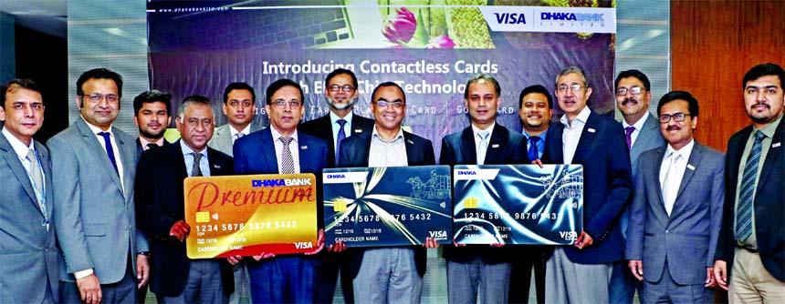 Syed Mahbubur Rahman, Managing Director of Dhaka Bank Limited, unveiling its full range of contactless cards with embedded EMV Chip technology with Visa at the Bank's head office in the city on Saturday. With this, the Bank has embarked on the journey of