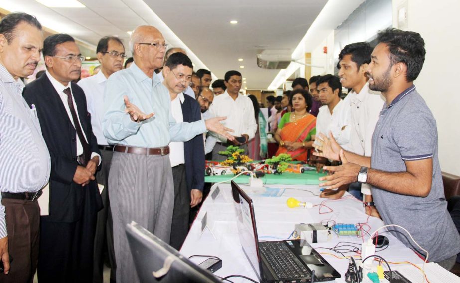 Education Minister Nurul Islam Nahid inquires a project after inaugurating Skills Competition-2018 organised by Skills and Training Enhancement Project in the city on Thursday.