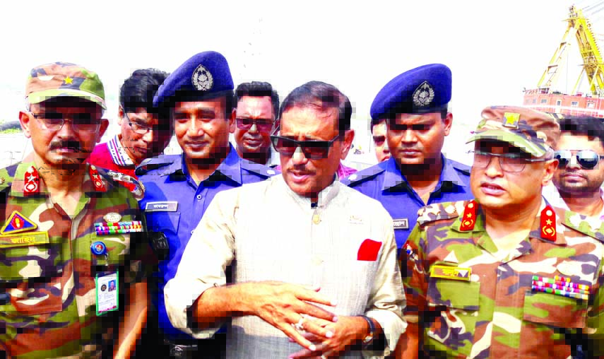 Road Transport and Bridges Minister Obaidul Quader talking to journalists and local elite at Maowa ghat in Shariatpur on Saturday when he visited the development works of the Padma Bridge.