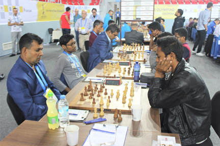 Players of Bangladesh Open team (left) in action against Madagascar Open team during the fifth round matches of the 43rd World Chess Olympiad at Sports Place in Batumi, Georgia on Friday.