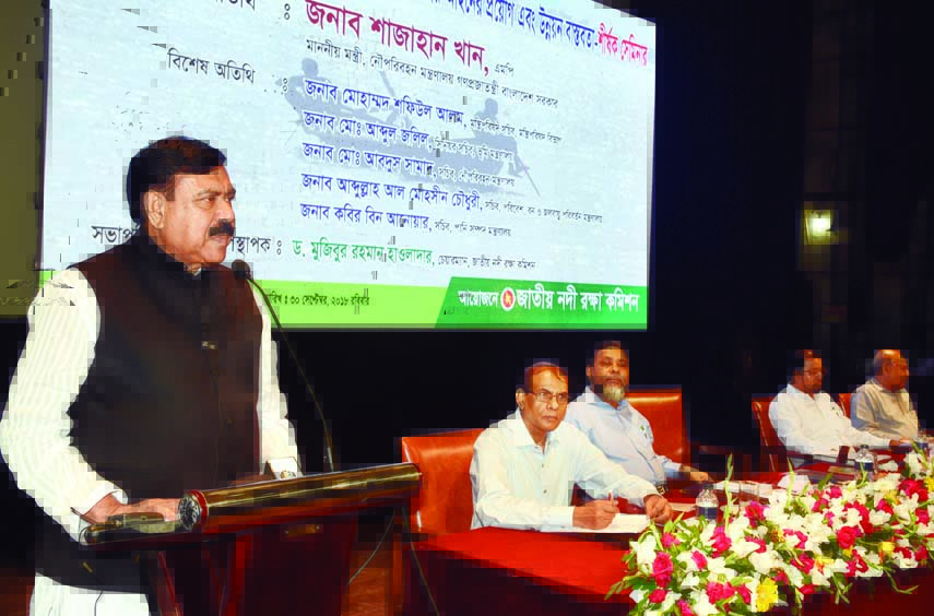 Shipping Minister Shajahan Khan speaking as Chief Guest at a seminar on application of law in protection of rivers and development at National Museum Auditorium yesterday.