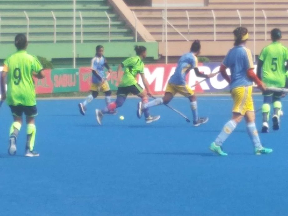 A moment of the semi-final match of the Walton 4th National Women's Hockey Competition between Khulna Division and Rangpur Division at the Maulana Bhashani National Hockey Stadium on Sunday. Khulna won the match 2-0.