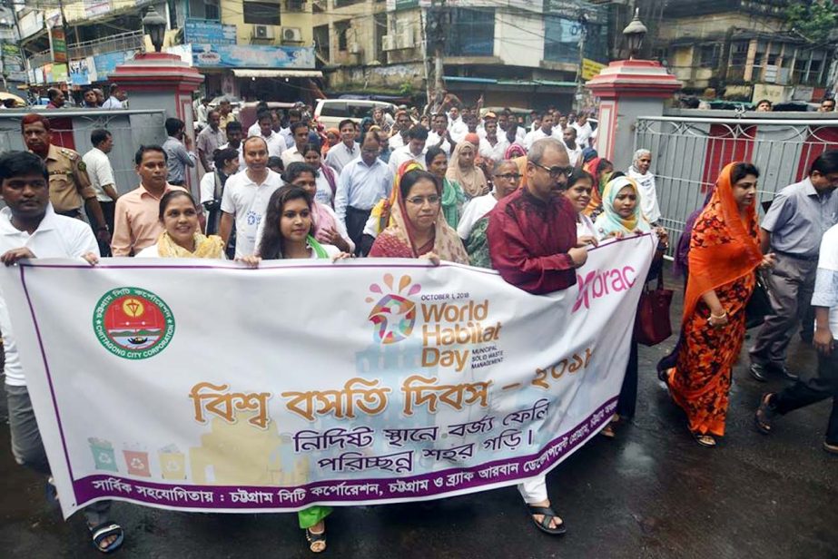 CCC Mayor A J M Nasir Uddin led a rally on the occasion of the World Habitat Day on Monday.