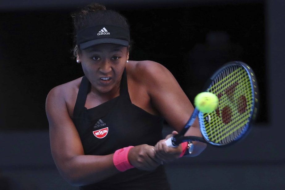 Naomi Osaka of Japan, hits a return shot while competing against Anastasija Sevastova of Latvia, in their women's singles semifinal match in the China Open at the National Tennis Center in Beijing on Saturday.