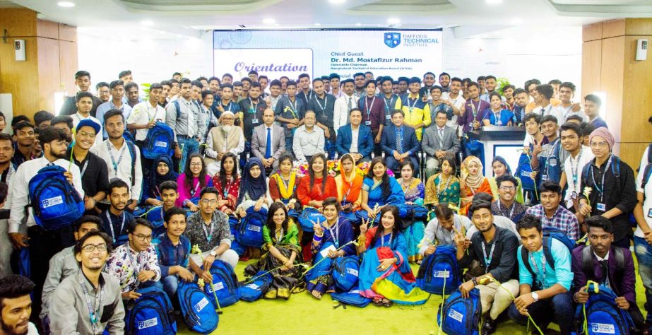 Newly enrolled Diploma in Engineering students of 2018-19 of Daffodil Technical Institute are seen at a photo show with the guests at their orientation program held at Daffodil International University recently.