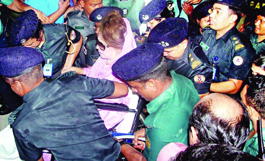 BNP Chairperson Begum Khaleda Zia being taken to BSMMU in a wheel chair on Saturday from Old Central Jail at Nazimuddin Road for better treatment.