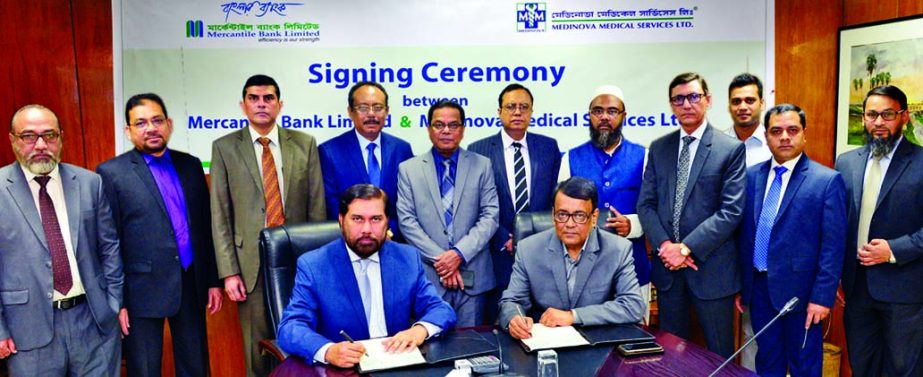 Mohammad Iqbal Rezwan, SEVP and Head of HRD of Mercantile Bank Limited and Shafiqur Rahman, Executive Director of Medinova Medical Services Ltd, sign an agreement at the Bank's head office recently. Under this deal, the Bank's employees and their depend