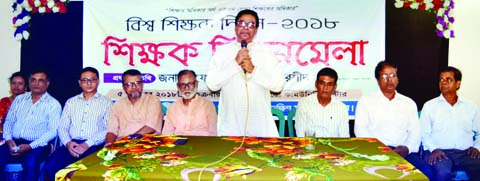 SYLHET: Prof Harun -ur- Rashid, Director, Secondary and Higher Secondary Education Board, Sylhet speaking at a discussion meeting marking the World Teachers' Day organised by Bangladesh Teachers' Association, South Surma Upazila Unit recently.
