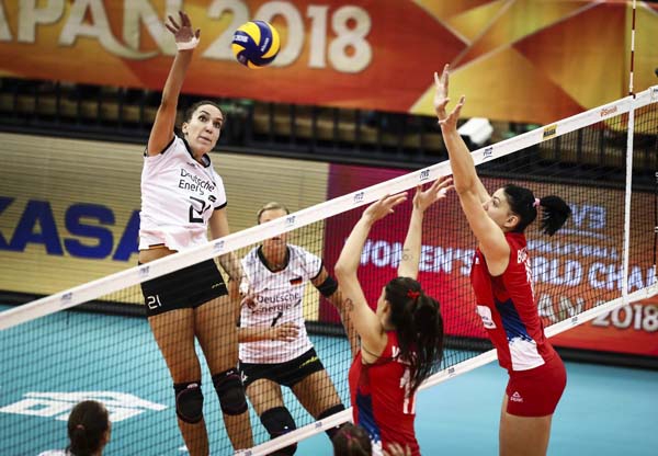In this photo provided by FIVB, Germany's Ivana Vanjak spikes during their second round match against Serbia at the FIVB Volleyball Women's World Championship in Nagoya, western Japan on Monday.