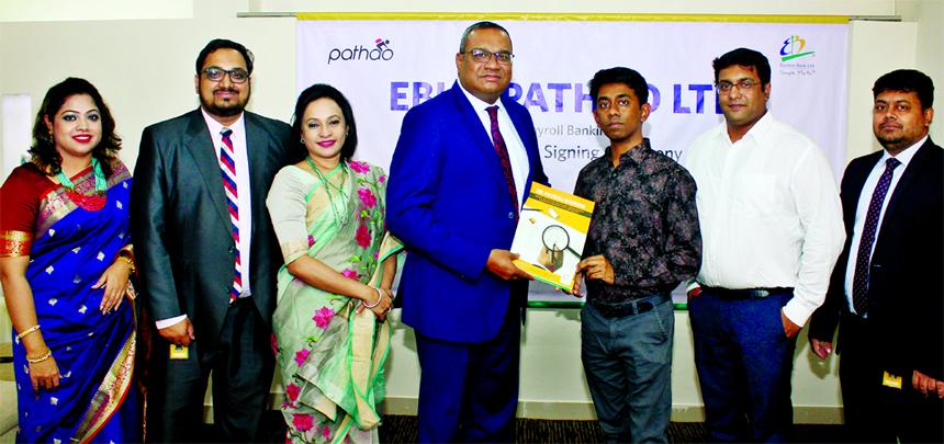 M Khorshed Anowar, Head of Retail Banking of Eastern Bank Limited and Hussain Mohammed Elius, CEO of Pathao Limited, exchanging an agreement signing documents on Payroll Banking at the Bank's head office in the city recently. Tasnim Hussain, Head of Payr