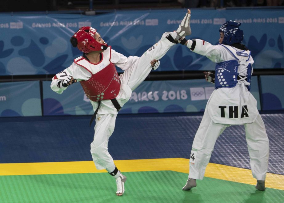 Morocco's Safia Salih (left) fights Thailand's Kanthida Saengsin during a Women's Taekwondo -55kg event at Youth Olympic Park during the Youth Olympic Games in Buenos Aires, Argentina on Tuesday.