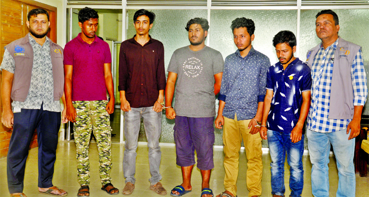 Five members of criminal gangs were detained from Alipnagar area in city's Badda thana allegedly linked with question leakage of medical college admission test. The photo was taken from CID media centre on Thursday.