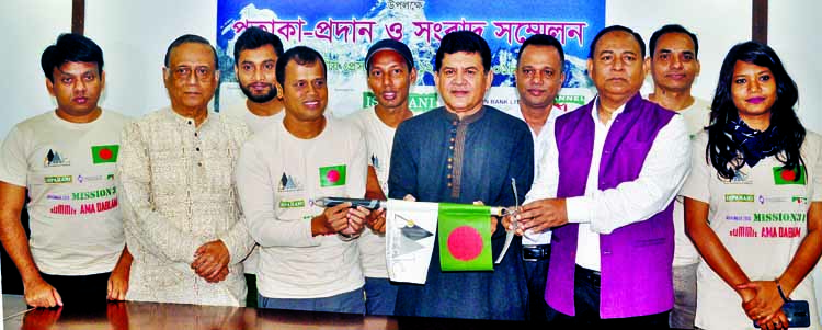 Former Adviser to the Caretaker Government Hossain Zillur Rahman, among others, at a ceremony organised on the occasion of Bangladesh's expedition in mountaineering and flag exchanging by Bangla Mountaineering and Trekking Club at the Jatiya Press Club o