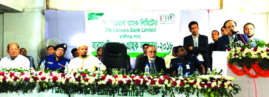 Ehsan Khosru, Managing Director of Farmers Bank Limited, addresing the Business Development and clients view exchange meeting at Hajiganj in Chandpur recently. Senior officials of the Bank were also present.