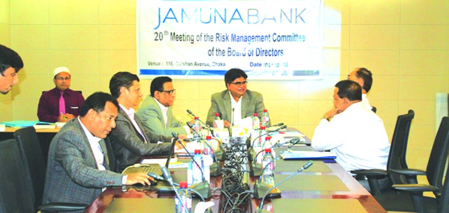 Md. Sirajul Islam Varosha, Chairman of the Risk Management Committee of Jamuna Bank Limited, presiding over its 20th meeting at the Bank's head office in the city recently. Shafiqul Alam, Managing Director, Robin Razon Sakhawat, Md. Belal Hossain, Md. Ma