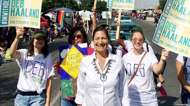 Native American candidate Deb Haaland who is running for Congress in New Mexico's 1st congressional district seat for the upcoming midterm elections, is surrounded by supporters at a picnic rally in Albuquerque, New Mexico