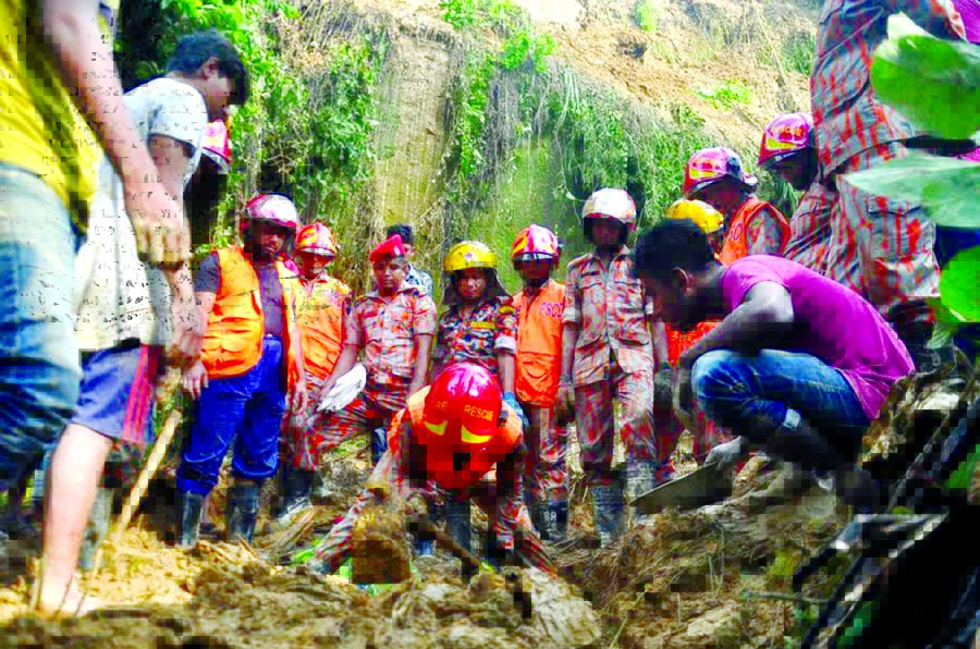 Fire fighting units rushed in two incidents of hill slides and rescued 3 people including a child at Akbar Shah thana in Port City on Sunday.