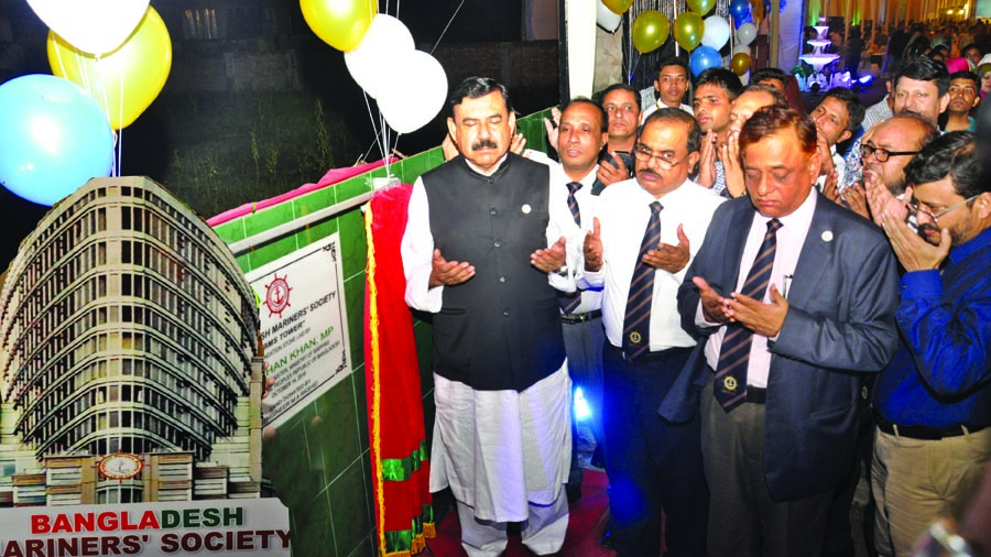 Shipping Minister Shajahan Khan along with others offering munajat after laying foundation stone of the own building of Bangladesh Mariners' Society in the city's Baridhara area on Sunday night.