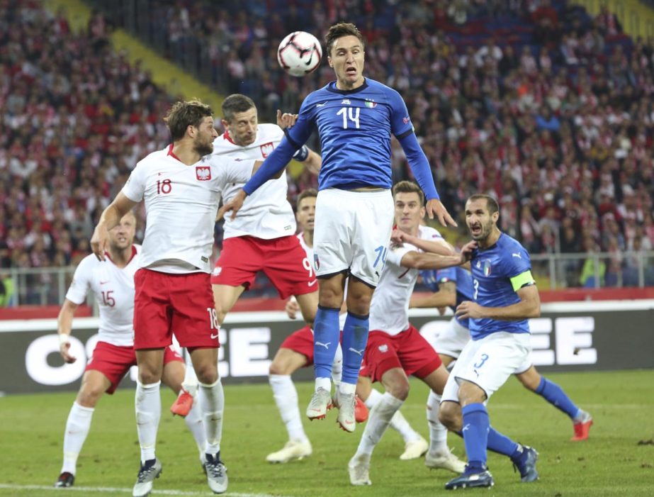 Italy's Federico Chiesa (right) makes an attempt to score during the UEFA Nations League soccer match between Poland and Italy at the Silesian Stadium Chorzow, Poland on Sunday.