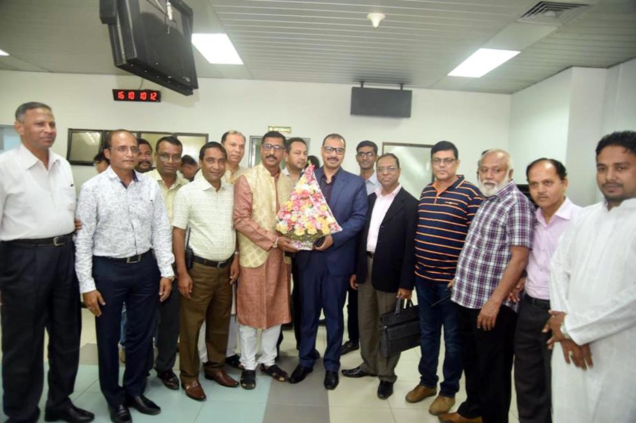 High officials of CCC greeting CCC Mayor A J M Nasir Uddin after arrival from china on yesterday.