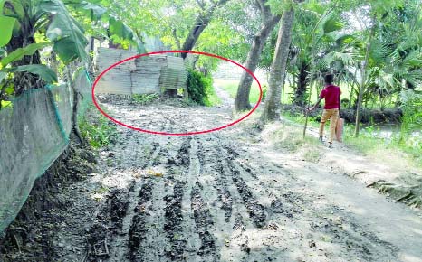 KALAPARA(Pauakhali): Some 250 meters long Kuakata- Pakhimara Highway has been grabbed by erecting dwelling houses. Authority concern yet to take any step. This snap was taken yesterday.