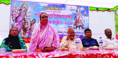 RAMPAL-MONGLA: Habibun Nahar MP speaking at a discussion meeting after visiting Puja mandaps in Rampal Upazila yesterday morning.