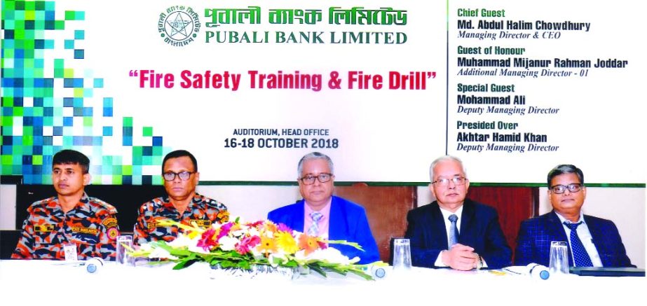 Muhammad Mijanur Rahman Joddar, AMD-1 of Pubali Bank Limited, presiding over a training course on 'Fire Safety Training & Fire Drill' organized by the Bank's Establishment Division at its head office in the city recently. Akhtar Hamid Khan, DMD and Ift