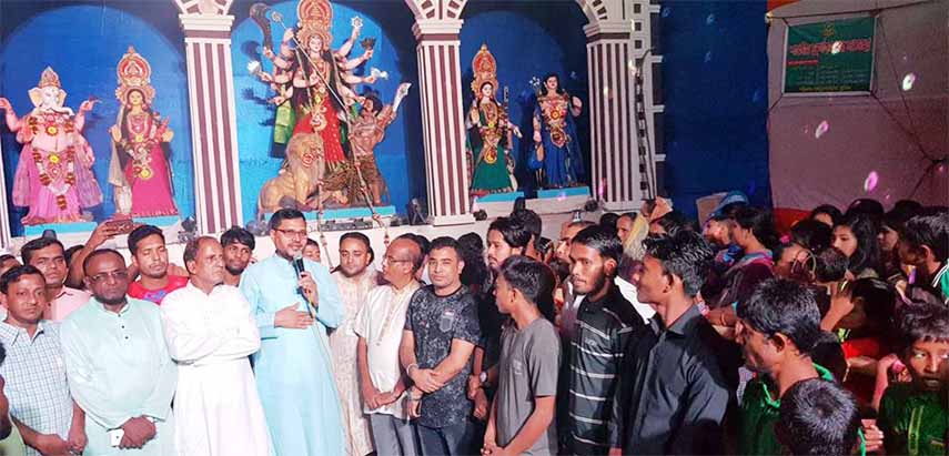 Chattogram City BNP Vice President Abu Sufian exchanging greeting with the Hindu community at Chandgaon and East Sholoshhar in the Port City yesterday.