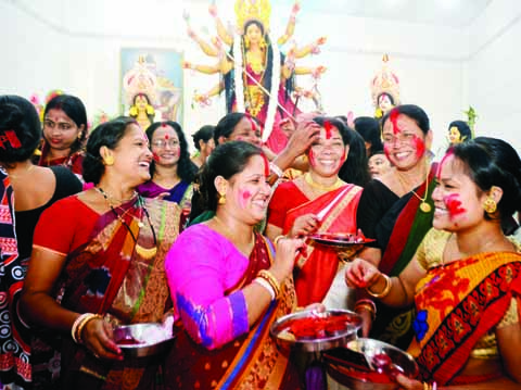 BOGURA: Hindu community celebrating Durga Puja at Cholopara Mandap in Bogura town yesterday.