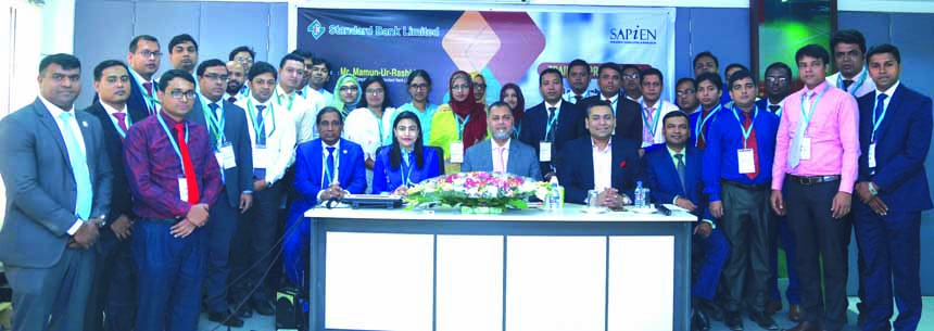 Mamun-Ur-Rashid, Managing Director of Standard Bank Limited poses for photo session with the participants of a two day-long training on "Self Leadership, Advanced Managerial Skills & 21st Century Managerial Mindset" organized by the Training Institute o