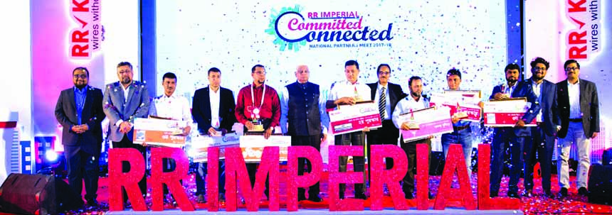 Participants posing with their crest and certificates in presence of Chairman of RR-Imperial Electricals Limited, Tri Bhuban Prasad Kabra and Director and CEO Mahbub Hossain Mirdha and other officials at `The National Partner's meet 2017-18' of the comp