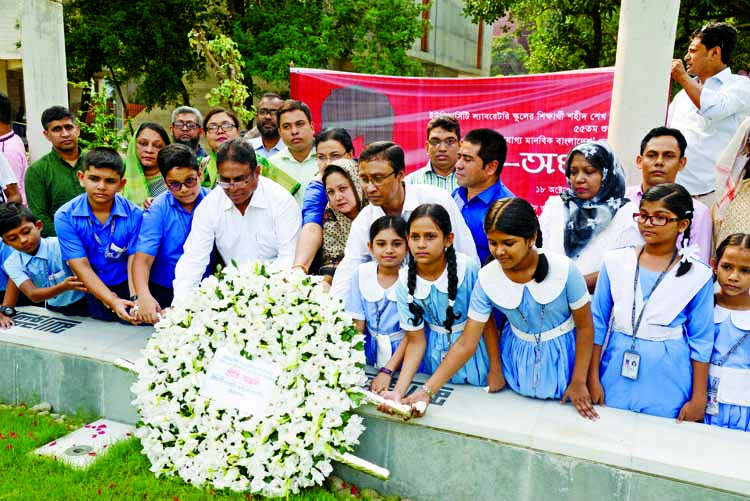 University Laboratory Ex-Students Association (ULESA) placing wreath at the grave of Sheikh Russell in the Banani graveyard on the occasion of his 55th birth anniversary on Thursday.
