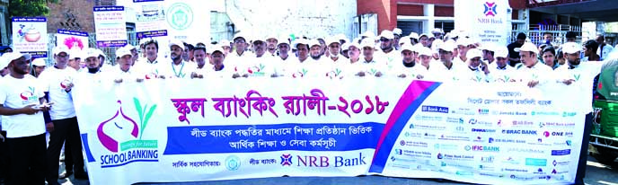 Syed Tariquzzaman, Executive Director of Bangladesh Bank, attended a rally on School Banking Campaign 2018 as chief guest organized by NRB Bank Limited at Kobi Nazrul Islam Auditorium in Sylhet recently. Saaduddin Ahmed, DMD of NRB Bank and Jiban Krishno