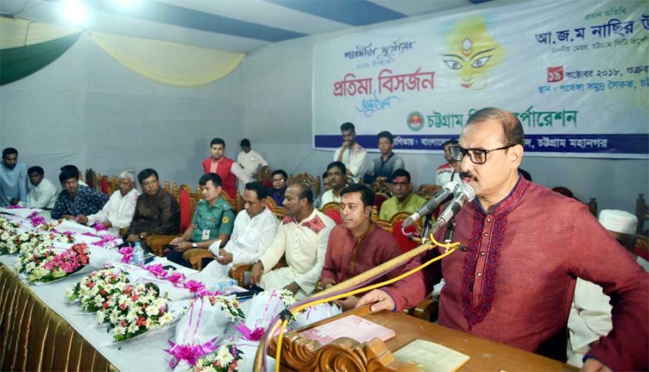 CCC Mayor A J M Nasir Uddin speaking at the immersion programme of Goddess Durga at Patenga Sea Beach as Chief Guest on Friday.