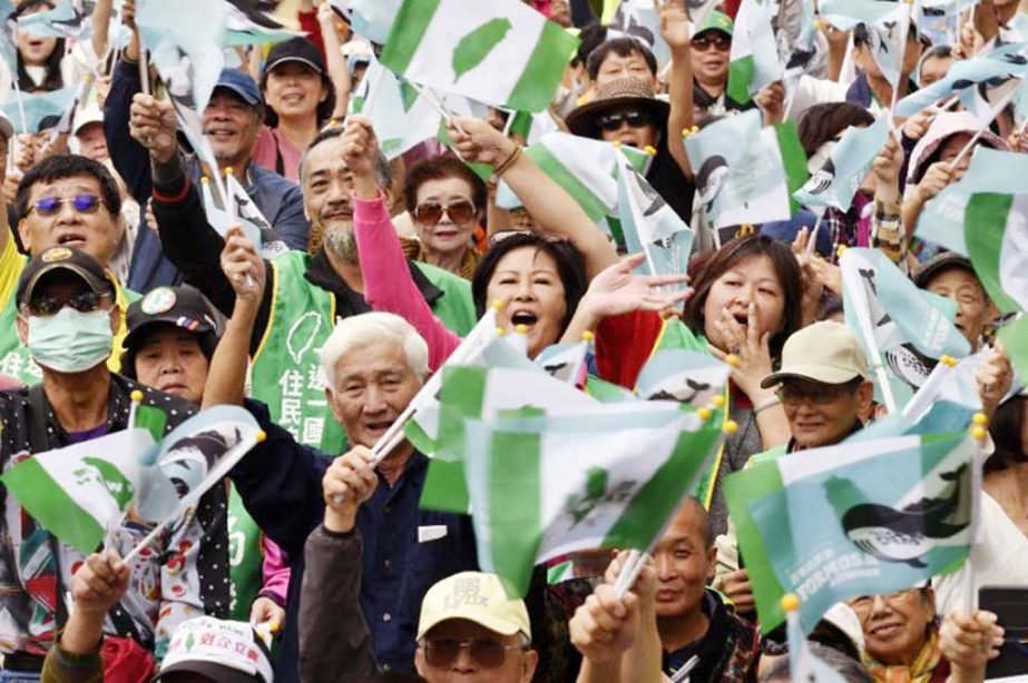 Pro-independence supporters take part in a rally to protest against what they claim are annexation efforts by China, and to call for a referendum, in Taipei, Taiwan.
