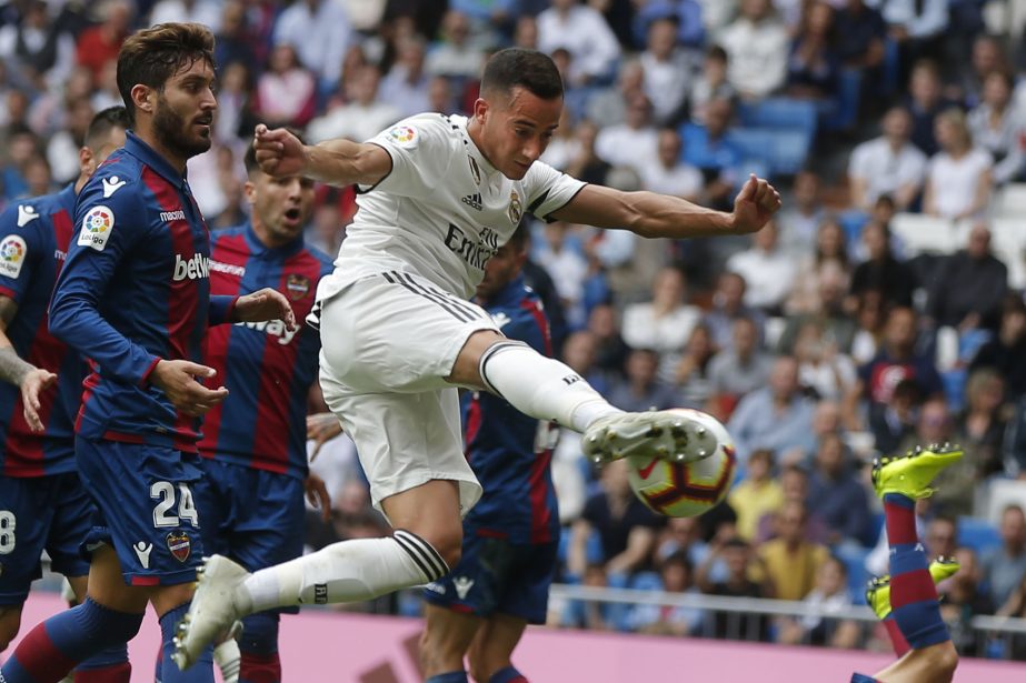 Real Madrid's Lucas Vazquez takes a shot on goal during a Spanish La Liga soccer match between Real Madrid and Levante at the Santiago Bernabeu stadium in Madrid, Spain on Saturday.
