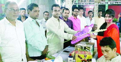 BANARIPARA (Barishal): Rahat Sumon, President, Banaripara Press Club distributing prizes among the winners of sports and cultural competition at Horisabha Mandir on the occasion of Durga Puja as Chief Guest on Saturday. .