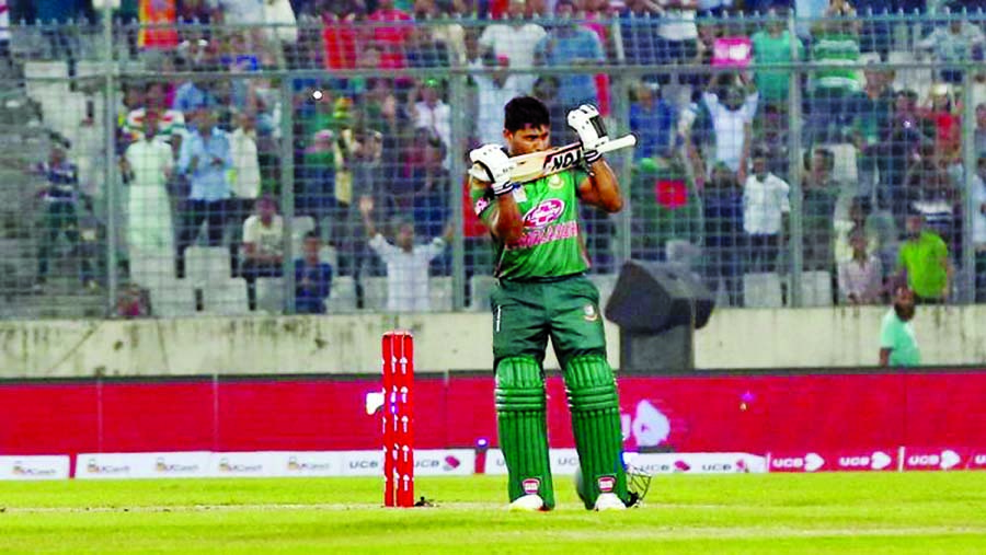 Imrul Kayes of Bangladesh celebrating his century against Zimbabwe in their first One Day International (ODI) match at the Sher-e-Bangla National Cricket Stadium in the city's Mirpur on Sunday.