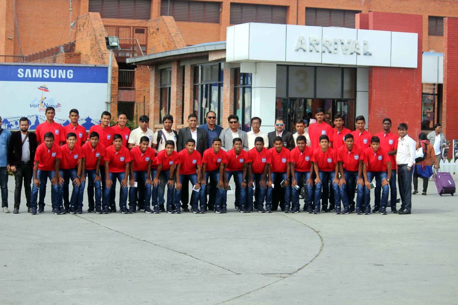 Bangladesh Under-15 National Football team with the officials pose for a photo session in Nepal on Tuesday.