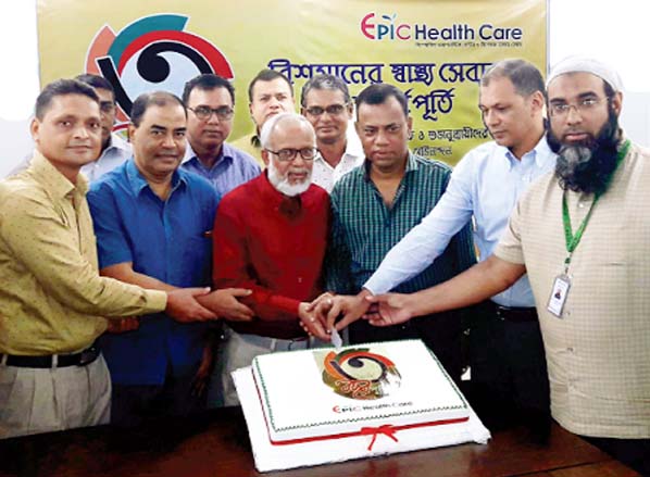 Engineer SM Lokman Kabir, Chairman, Epic Group cutting cake on the occasion of the 3rd founding anniversary of the Group as Chief Guest on Thursday. Among others, Engineer Anwar Hossain, Director, Mohammed Solaiman, Nasiruddin, Md. Abul Kalam Azad,