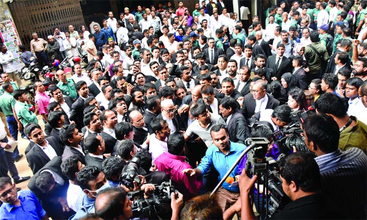 Hundreds of lawyers staged demonstration in front of CMM Court, demanding release of Barrister Mainul Hosein on Tuesday after he was sent to jail in a defamation case.