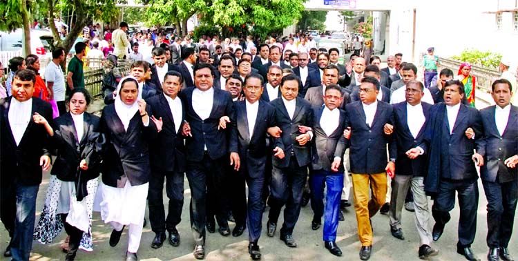 Hundreds of lawyers staged demonstration and chanting slogans on Supreme CourtHigh Court premises on Tuesday, demanding release of Barrister Mainul Hosein after he was sent to jail in a defamation case.