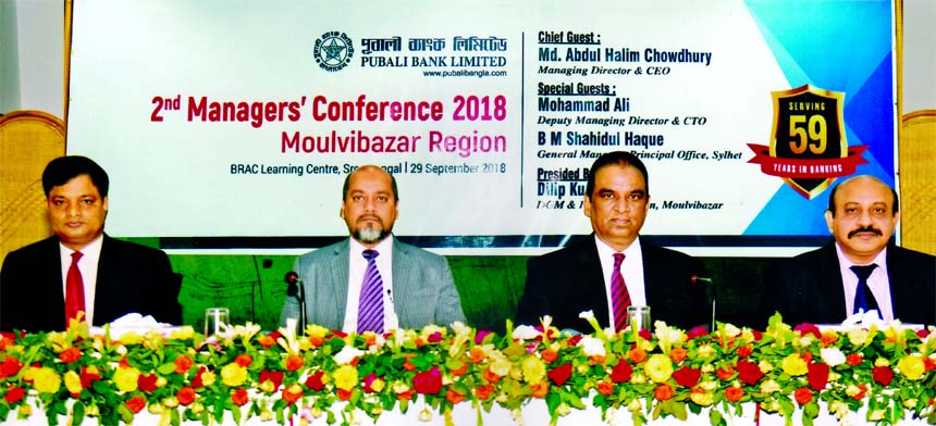 Md. Abdul Halim Chowdhury, Managing Director of Pubali Bank Limited, presiding over its 2nd Managers' Conference-2018 of Moulvibazar Region at a hotel in Sremongal recently. Mohammad Ali, DMD, B M Shahidul Haque, GM of Sylhet Principal Office and Dilip K