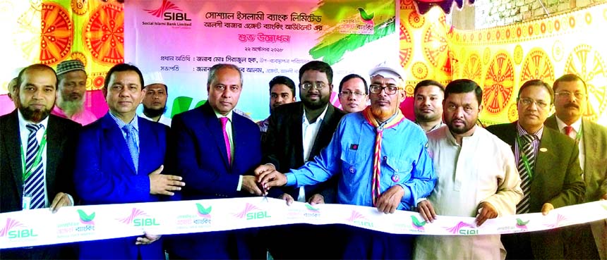 Md. Sirajul Haque, DMD of Social Islami Bank Limited, inaugurating its 81st Agent Banking Unit at Algi Bazar in Haimchar in Chandpur on Monday as chief guest. Faruque Ahmed, Head of Marketing, Md. Abdul Quader, SAVP, Shah Alam Sharker, AVP and other bank