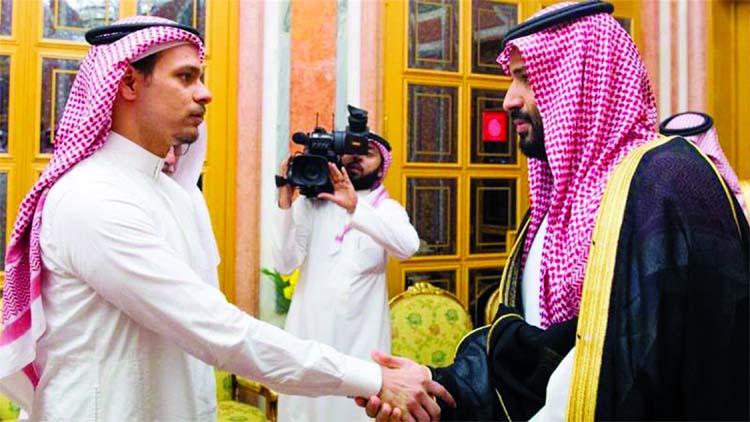 Saudi Crown Prince Mohammed bin Salman, (right), shakes hands with Salah Khashoggi, a son of Jamal Khashoggi, in Riyadh.